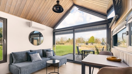 Woonkamer - Vakantiepark Si-Es-An Woonkamer - Vakantiepark Si-Es-An