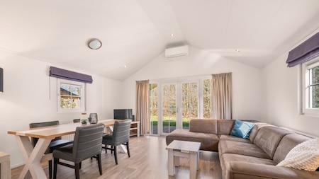 Woonkamer - Vakantiepark Si-Es-An Woonkamer - Vakantiepark Si-Es-An