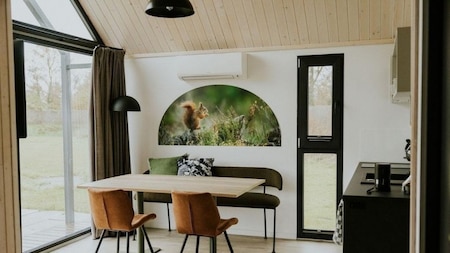 Woonkamer - Vakantiepark Si-Es-An Woonkamer - Vakantiepark Si-Es-An