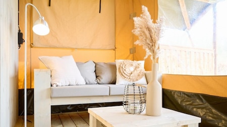 Woonkamer - Vakantiehoeve Si-Es-An Woonkamer - Vakantiehoeve Si-Es-An