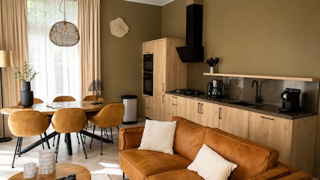 Woonkamer - Vakantiepark De Rimboe Woonkamer - Vakantiepark De Rimboe