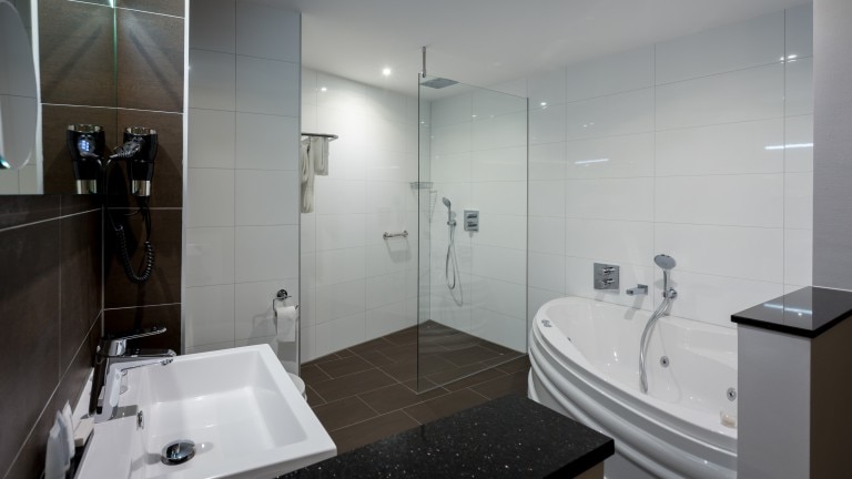 Comfort kamer met regendouche en bubbelbad - Boutique Hotel Scheepers