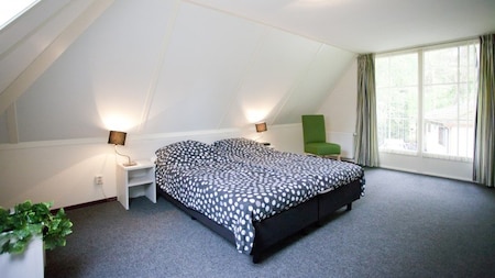 Slaapkamer - EuroParcs Beekbergen Slaapkamer - EuroParcs Beekbergen