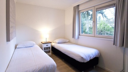 Slaapkamer - EuroParcs Beekbergen Slaapkamer - EuroParcs Beekbergen