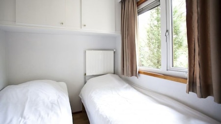 Slaapkamer - EuroParcs Beekbergen Slaapkamer - EuroParcs Beekbergen